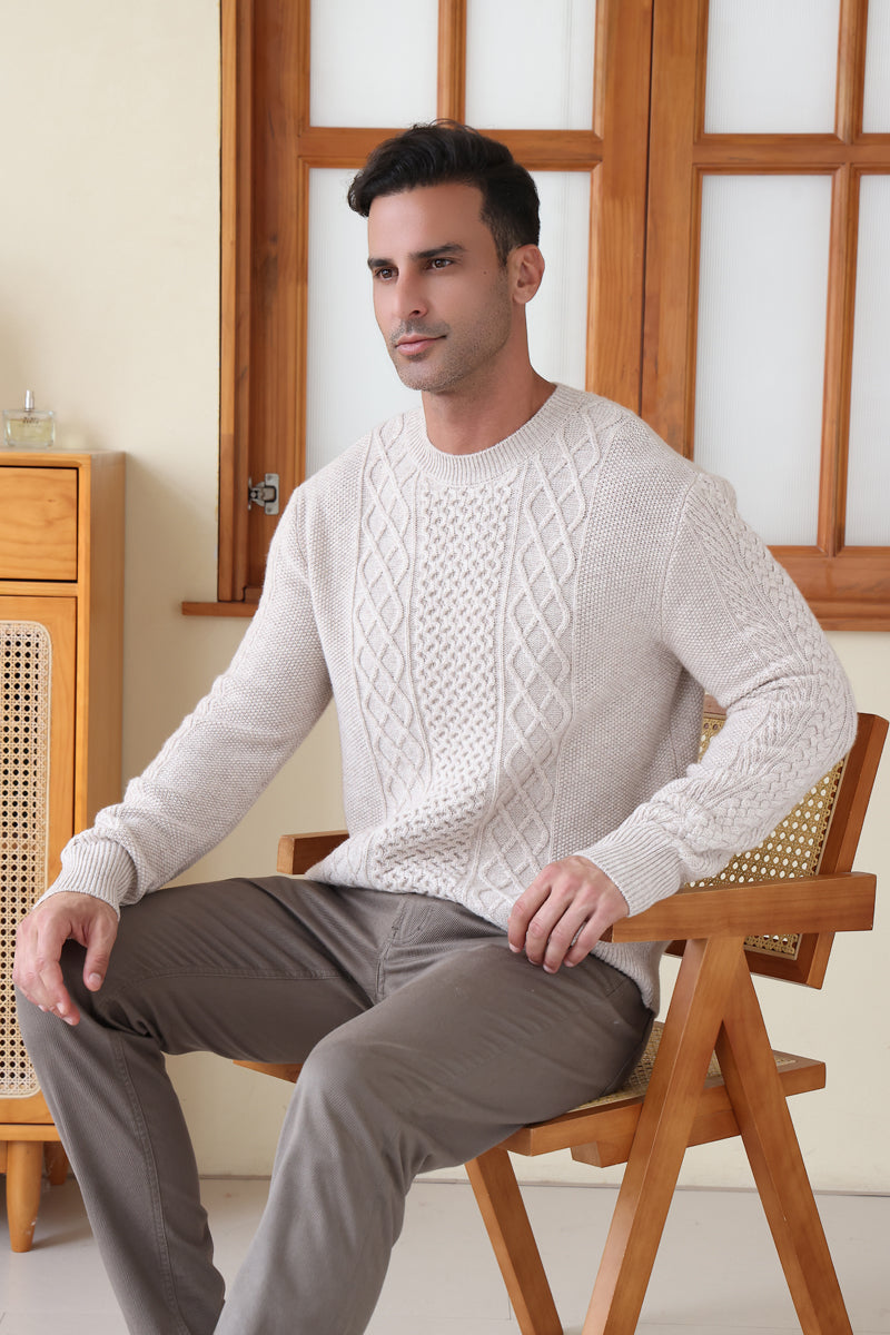 Man wearing a luxury aran cashmere cable knit sweater by Inis Aran Ireland#color_seoul-beige