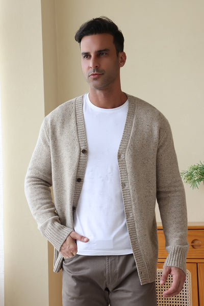 Man wearing a luxury Donegal Merino Button Cardigan by Inis Aran#color_ryewater