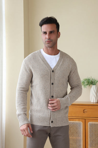 Man wearing a luxury Donegal Merino Button Cardigan by Inis Aran#color_ryewater