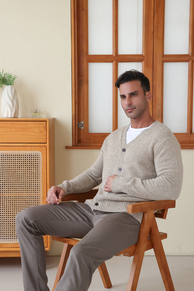Man wearing a luxury Donegal Merino Button Cardigan by Inis Aran#color_ryewater