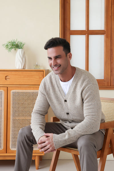 Man wearing a luxury Donegal Merino Button Cardigan by Inis Aran#color_ryewater