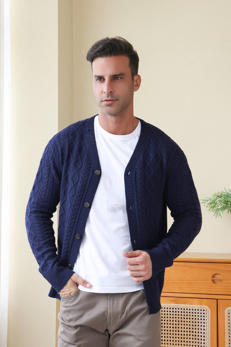 Man wearing an Aran Cable Knit Cardigan by Inis Aran Ireland#color_peacoat-navy