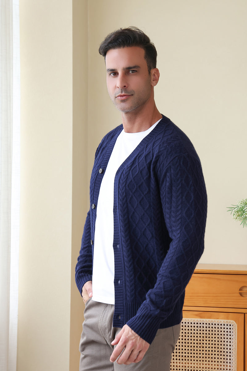 Man wearing an Aran Cable Knit Cardigan by Inis Aran Ireland#color_peacoat-navy