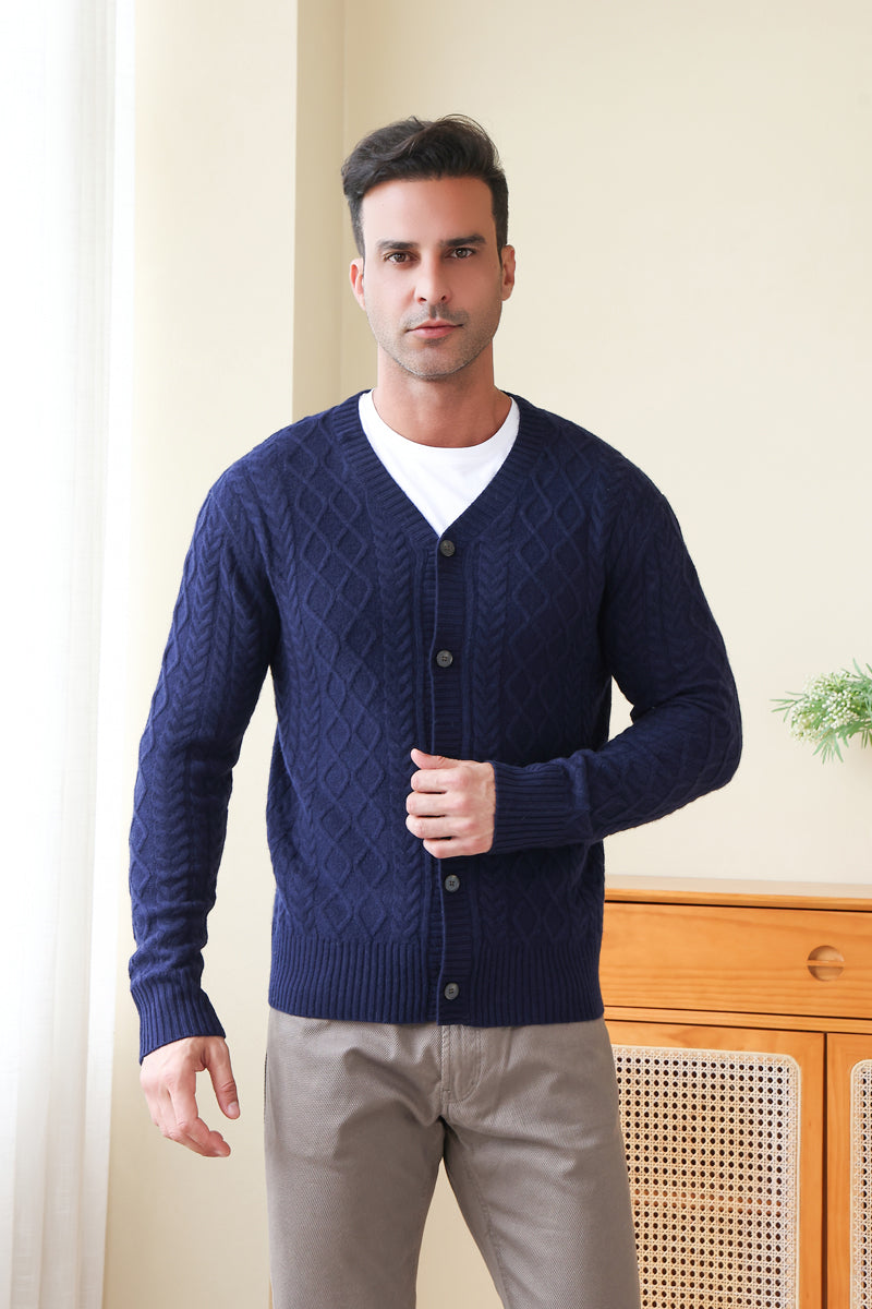 Man wearing an Aran Cable Knit Cardigan by Inis Aran Ireland#color_peacoat-navy