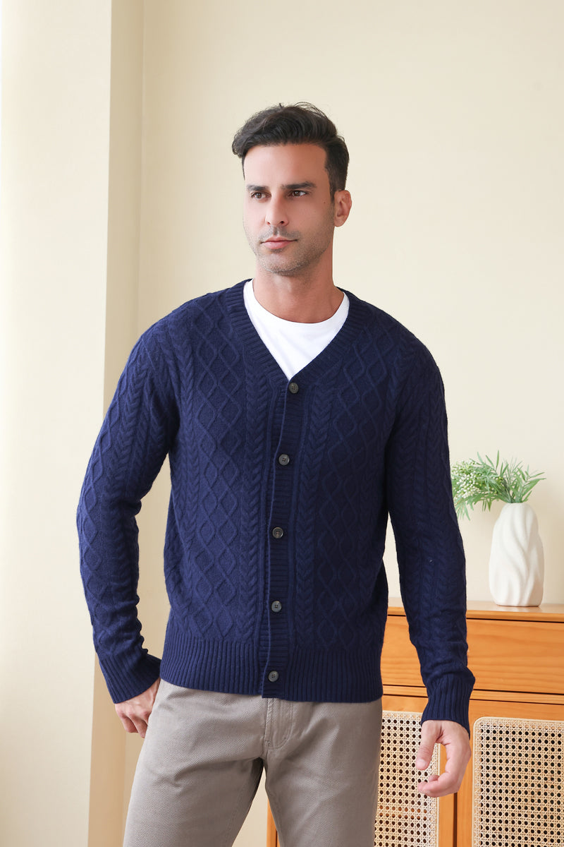 Man wearing an Aran Cable Knit Cardigan by Inis Aran Ireland#color_peacoat-navy