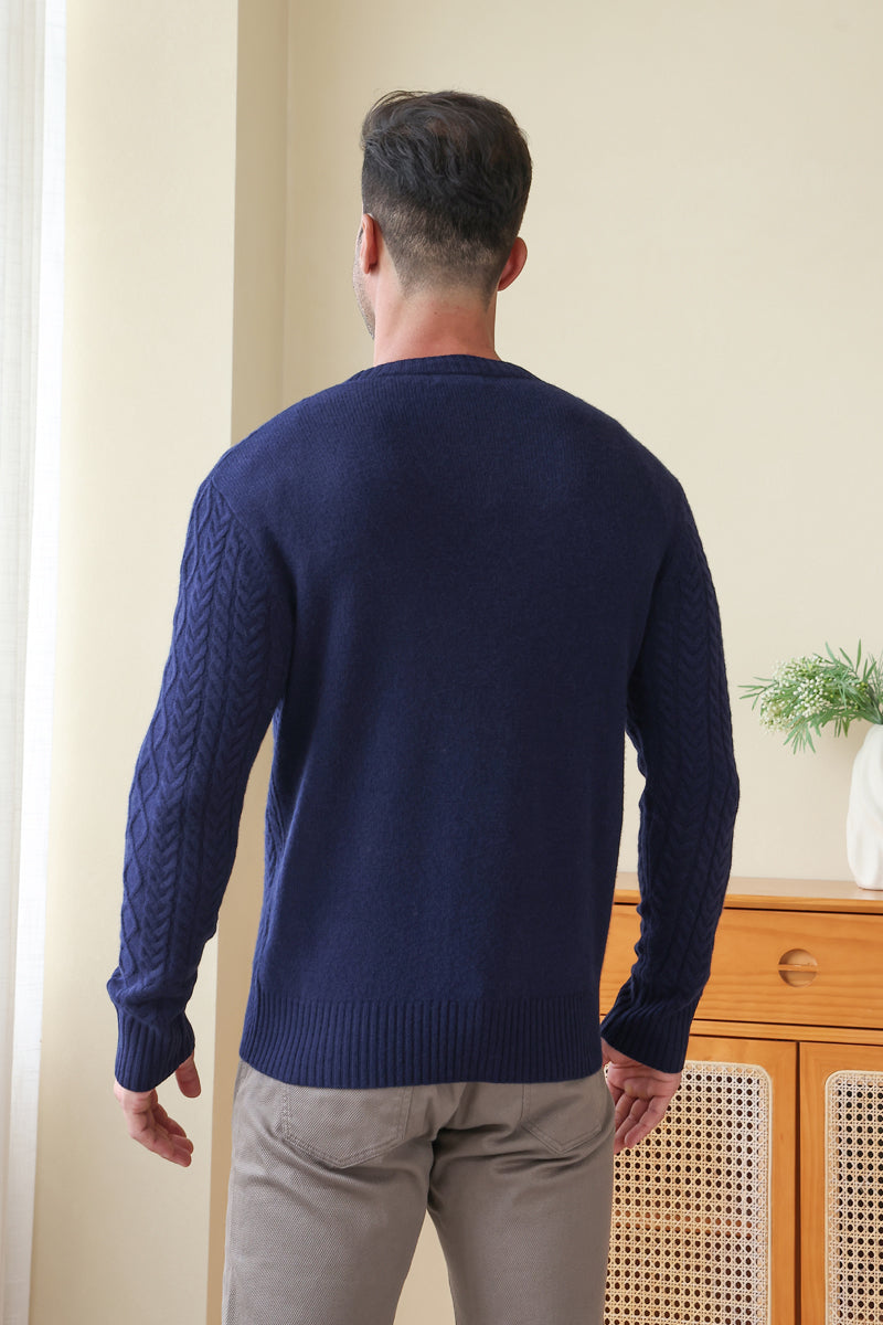 Man wearing an Aran Cable Knit Cardigan by Inis Aran Ireland#color_peacoat-navy