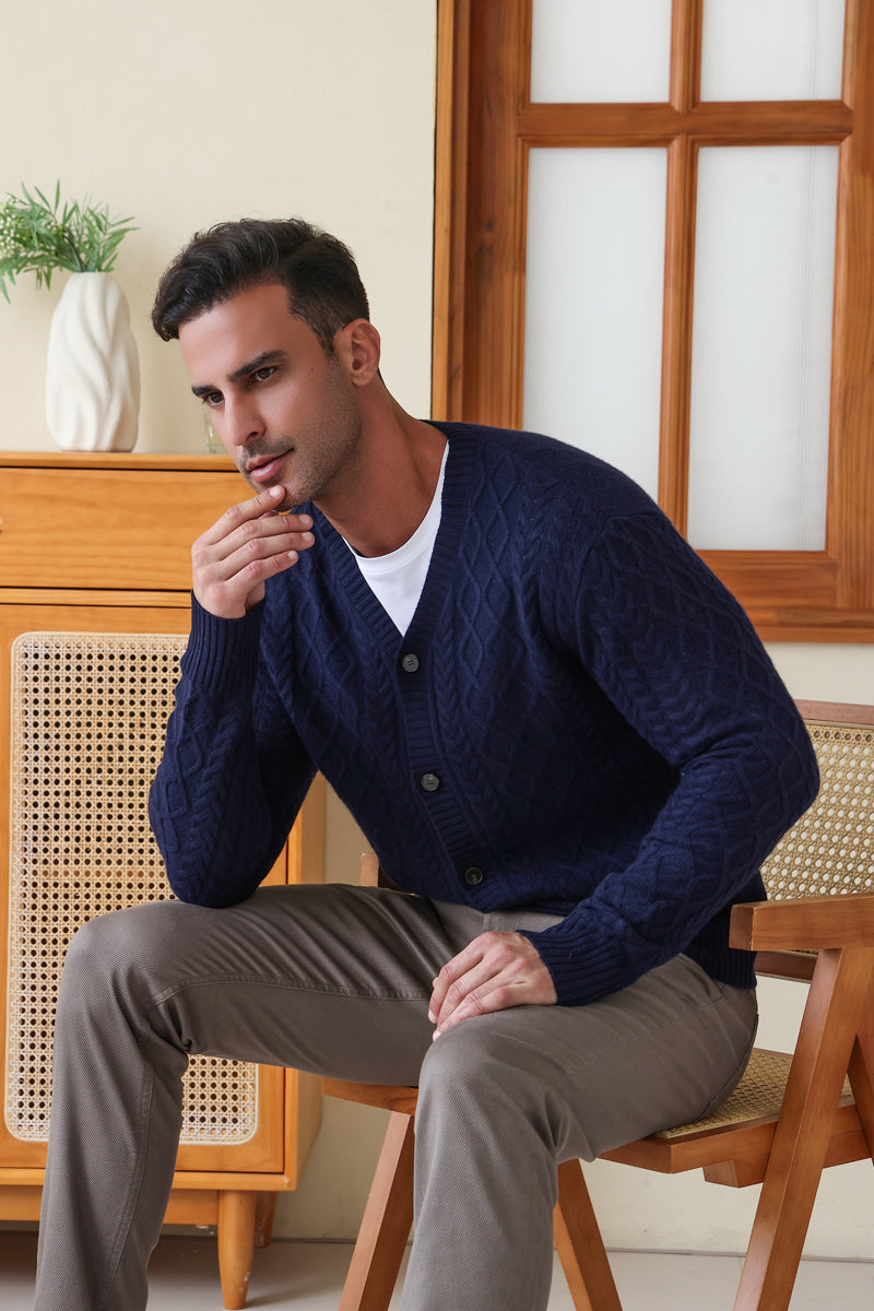 Man wearing an Aran Cable Knit Cardigan by Inis Aran Ireland#color_peacoat-navy