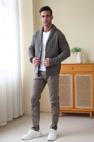 Man wearing the Aran cable shawl neck button cardigan by Inis Aran Ireland#color_grey-oxide