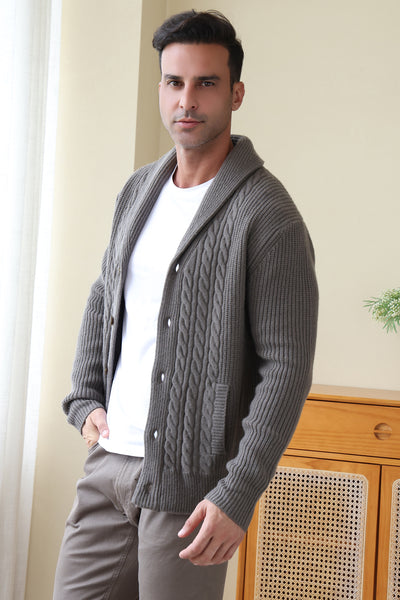 Man wearing the Aran cable shawl neck button cardigan by Inis Aran Ireland#color_grey-oxide
