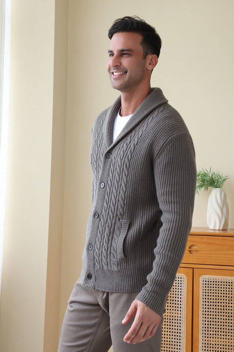 Man wearing the Aran cable shawl neck button cardigan by Inis Aran Ireland#color_grey-oxide