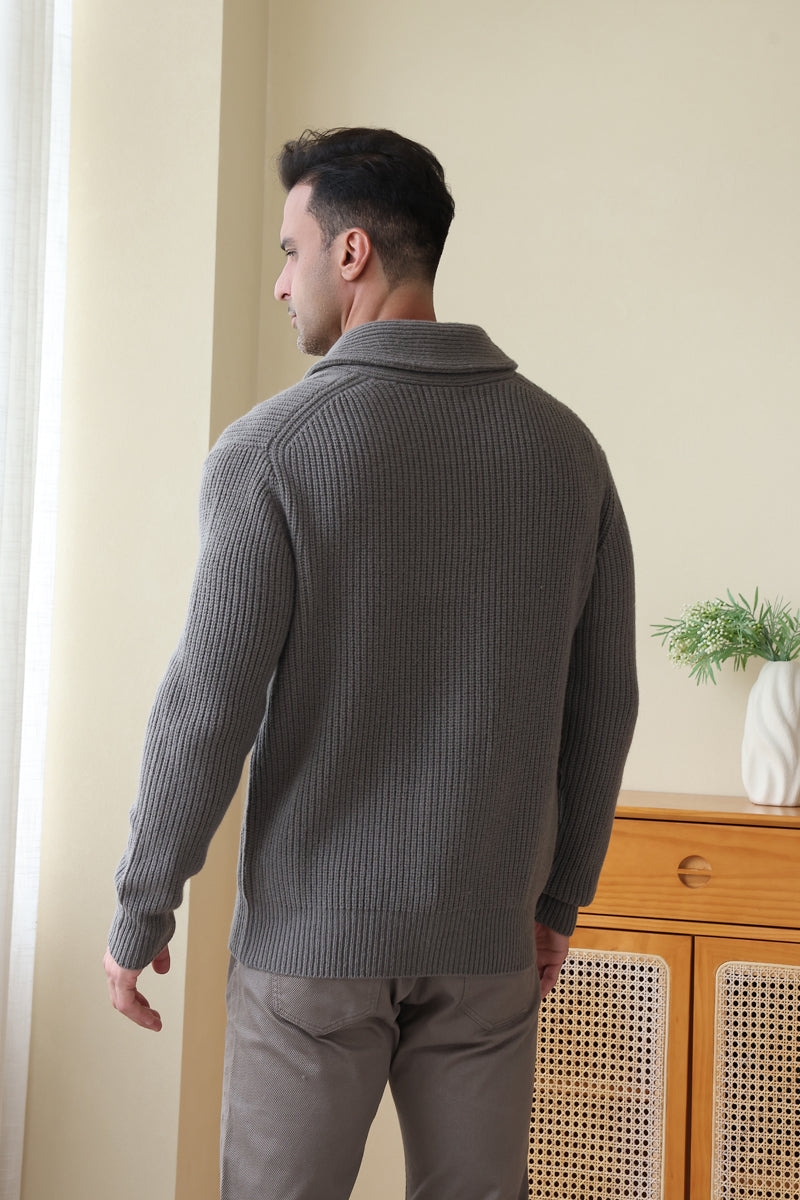 Man wearing the Aran cable shawl neck button cardigan by Inis Aran Ireland#color_grey-oxide