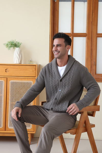 Man wearing the Aran cable shawl neck button cardigan by Inis Aran Ireland#color_grey-oxide