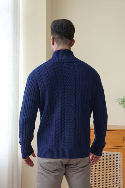 Man wearing the Luca Shawl Neck cable cardigan by Inis Aran#color_bright-navy