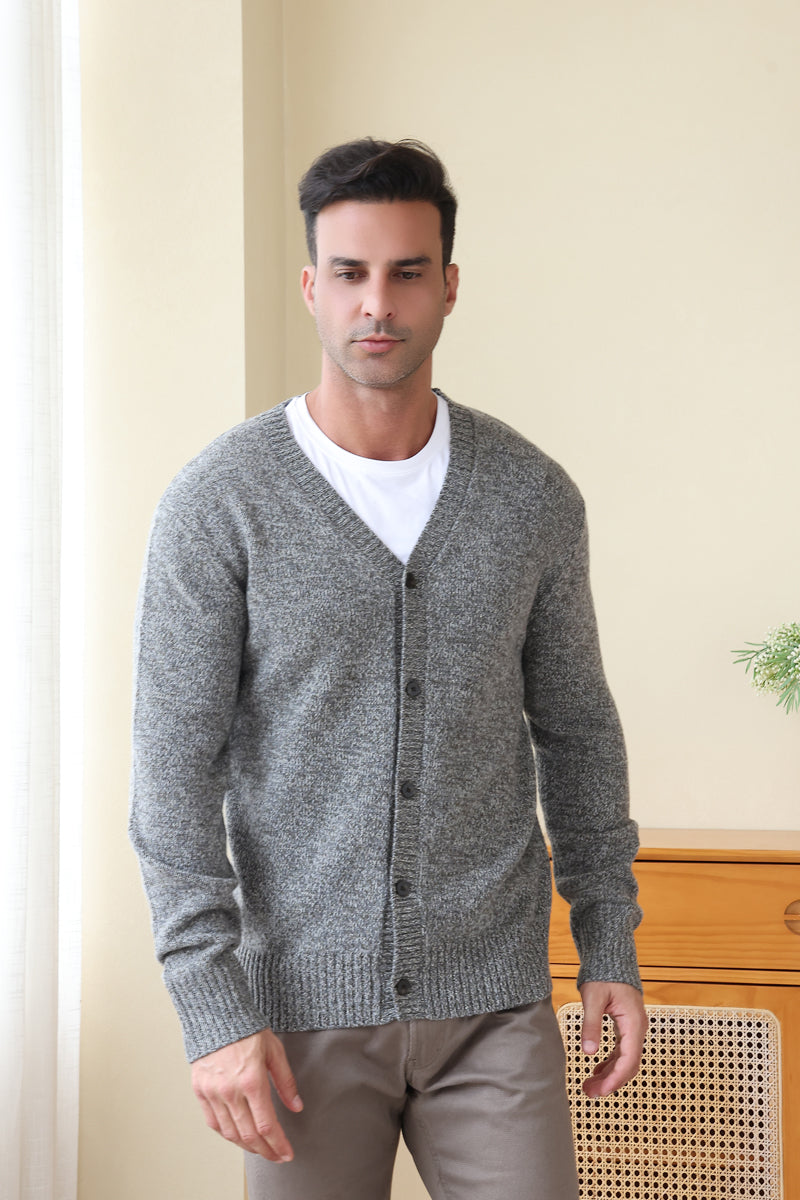 Man wearing the merino twill weave button cardigan by Inis Aran#color_forest-grey