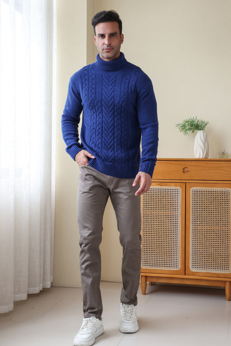 Man wearing a luxurious blue Aran cable knit sweater by Inis Aran Ireland#color_marine