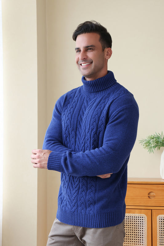 Man wearing a luxurious blue Aran cable knit sweater by Inis Aran Ireland#color_marine