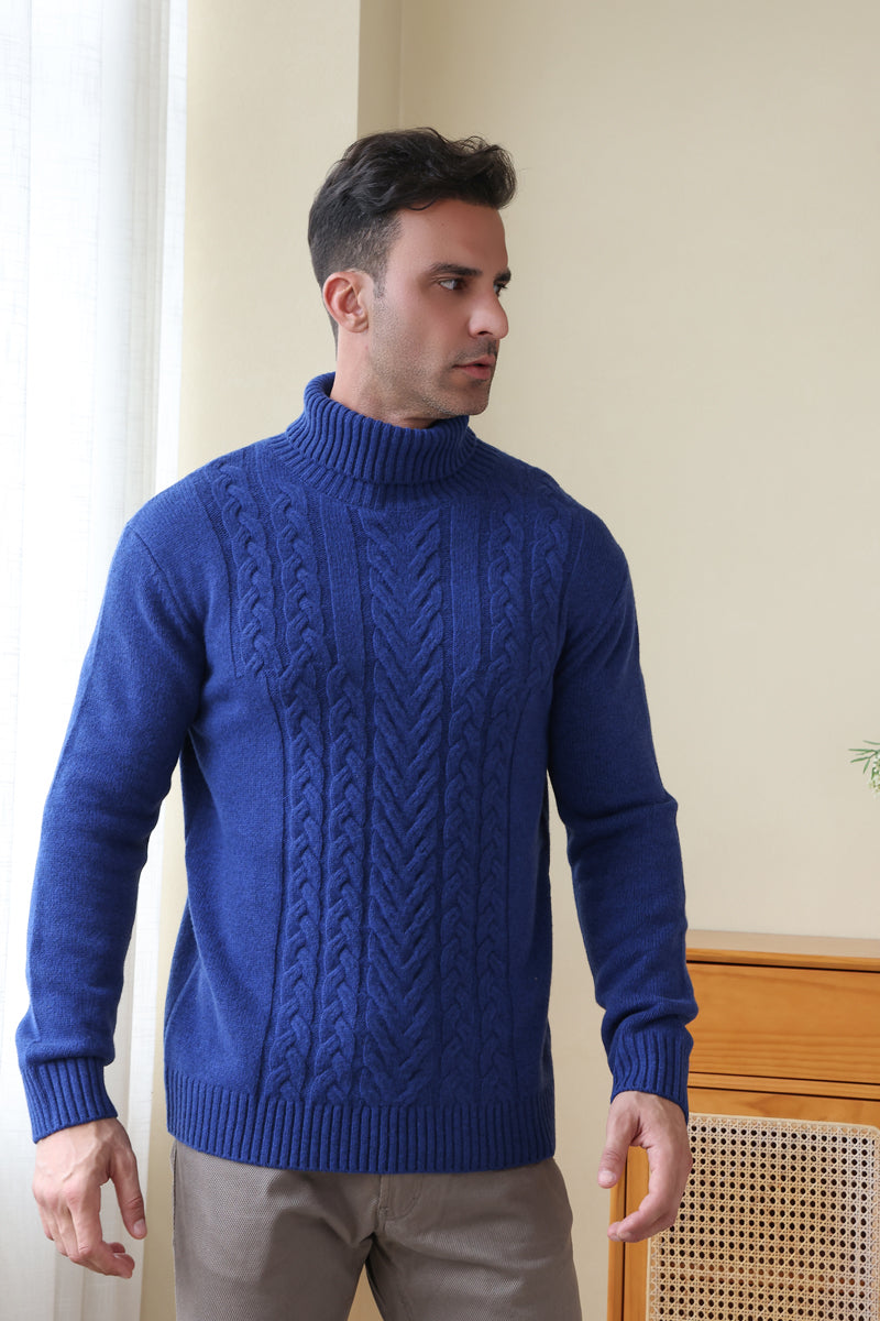 Man wearing a luxurious blue Aran cable knit sweater by Inis Aran Ireland#color_marine