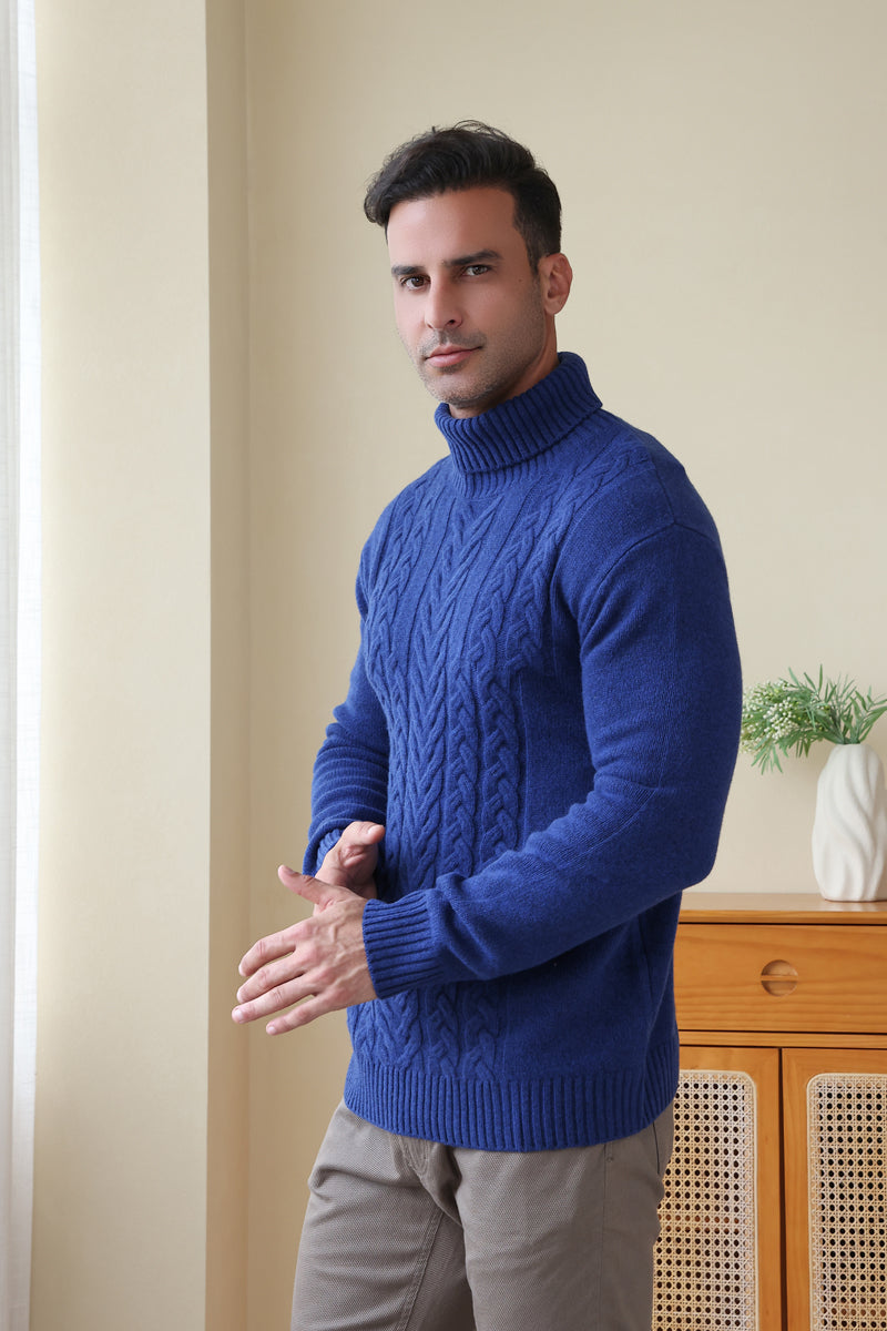 Man wearing a luxurious blue Aran cable knit sweater by Inis Aran Ireland#color_marine