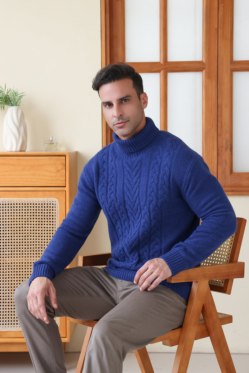 Man wearing a luxurious blue Aran cable knit sweater by Inis Aran Ireland#color_marine