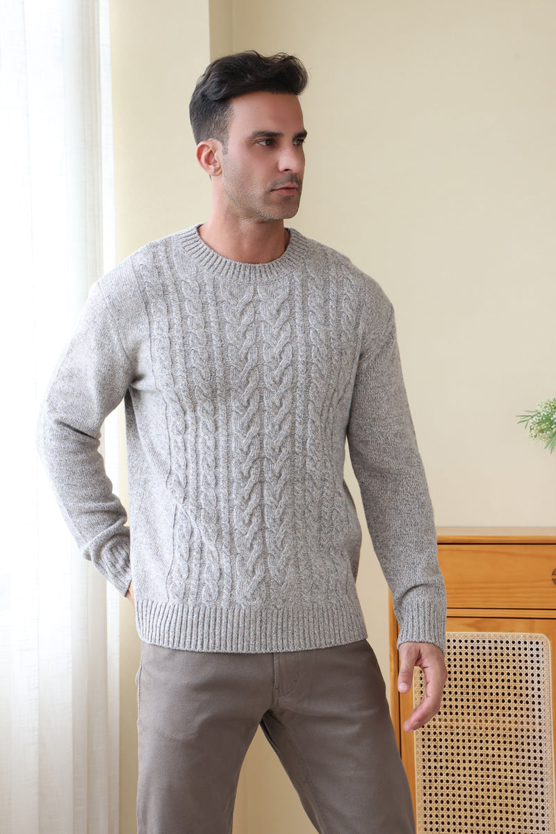 Man wearing a luxurious merino cable knit aran sweater in a twill weave#color_stone