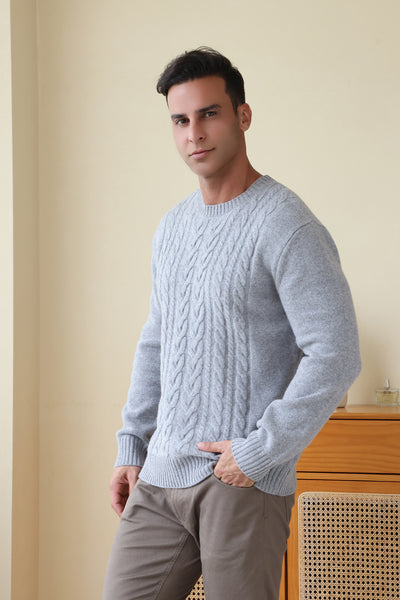 Man wearing the Inis Aran Jacob Aran Cable Merino Wool Sweater#color_ashen