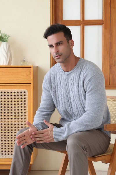 Man wearing the Inis Aran Jacob Aran Cable Merino Wool Sweater#color_ashen
