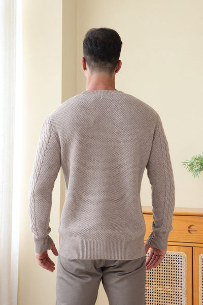 Man wearing a luxurious Aran Cashmere Sweater by Inis Aran Ireland#color_light-smoke