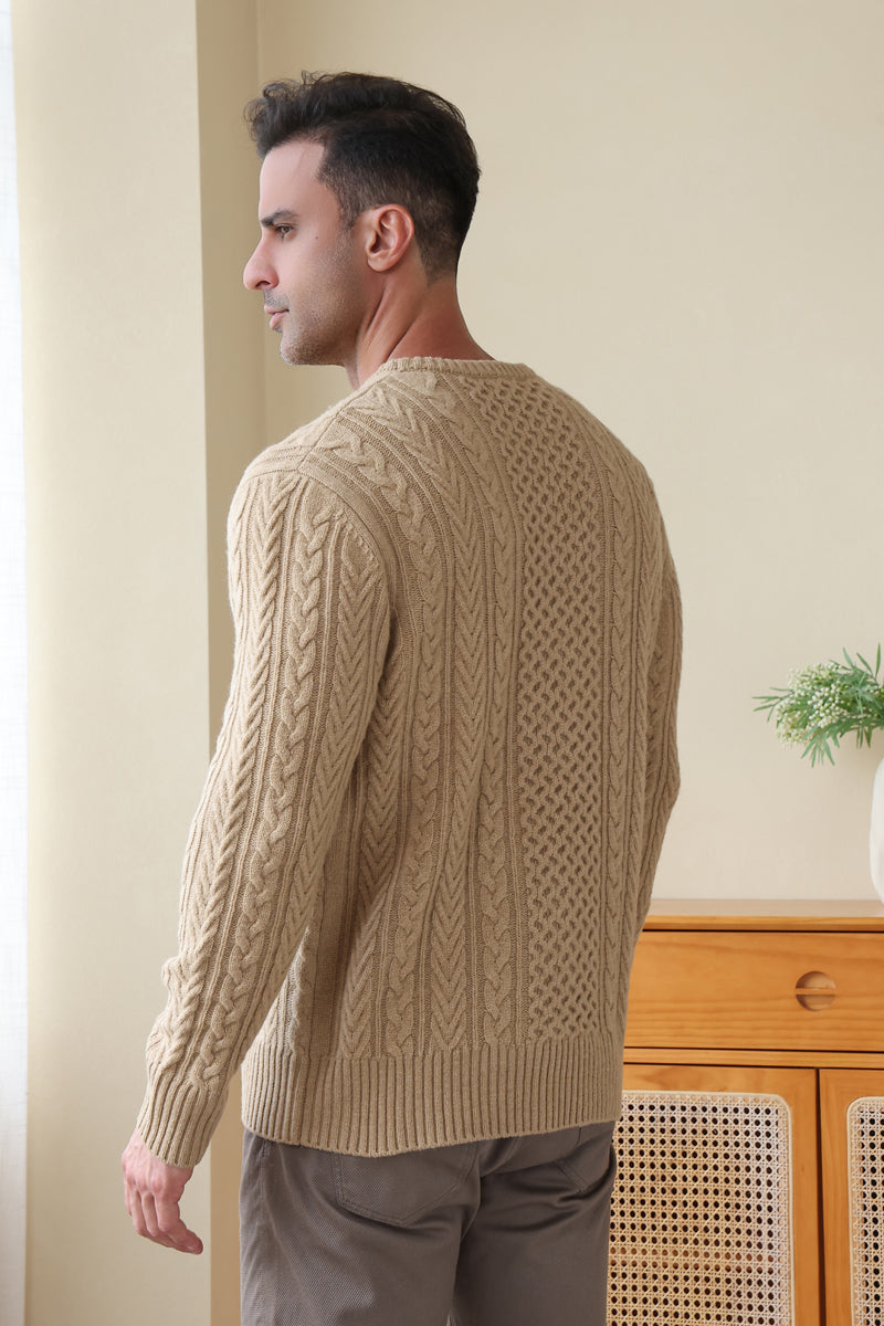 Man wearing a luxury merino aran knit sweater by Inis Aran#color_light-camel