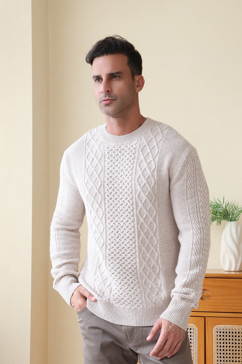 Man wearing a luxury aran cashmere cable knit sweater by Inis Aran Ireland#color_seoul-beige