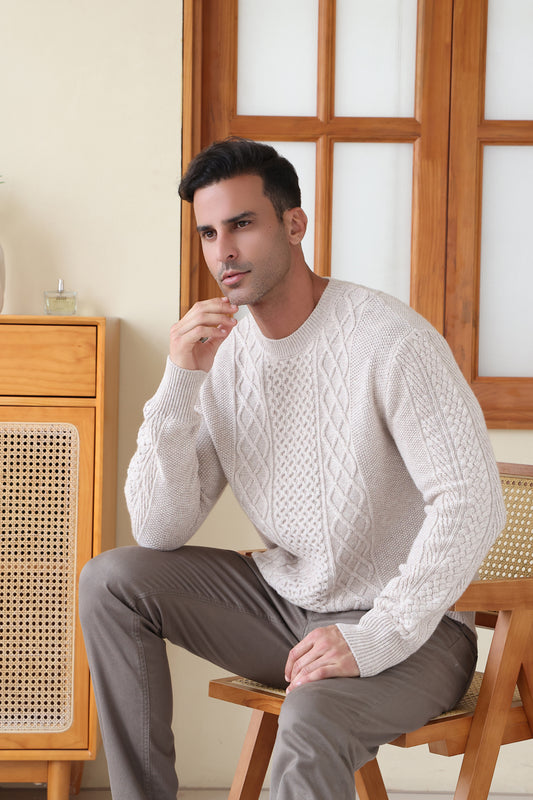 Man wearing a luxury aran cashmere cable knit sweater by Inis Aran Ireland#color_seoul-beige