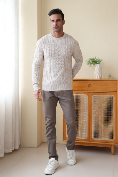 Man wearing a luxury wool cashmere aran sweater by Inis Aran#color_seoul-beige