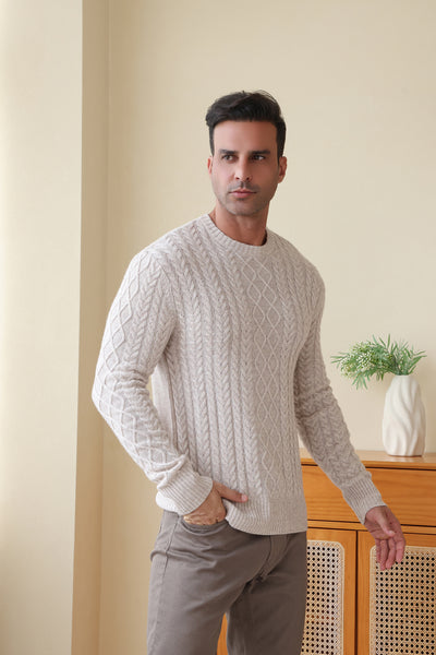 Man wearing a luxury wool cashmere aran sweater by Inis Aran#color_seoul-beige