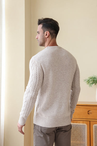 Man wearing a luxury wool cashmere aran sweater by Inis Aran#color_seoul-beige